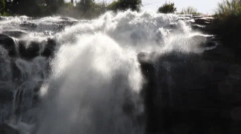White streams flowing from the waterfall Stock Footage 65333347
