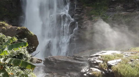 White streams flowing from the waterfall Stock Footage 65333683
