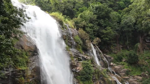 White streams flowing from the waterfall Stock Footage 65335793
