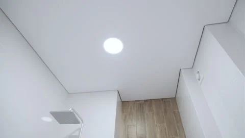 White stretch ceiling in a stylish bright bathroom. Modern design Stock Footage 244686417