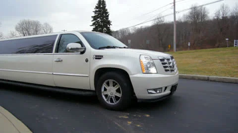 White Stretch Limo Exits Frame Stock Footage 22854845
