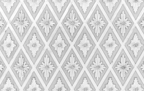 White stucco pattern over light gray backdrop. Classic ceiling moulding Stock Photos
