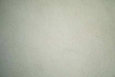 White stucco wall background. White painted cement wall texture Stock Photos