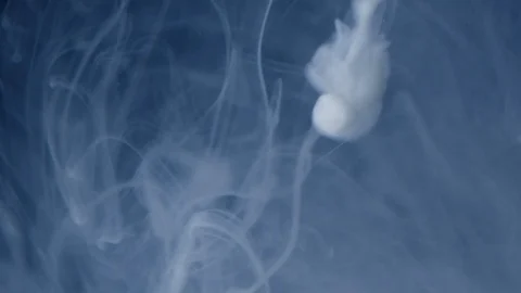 White Substance in the Form of Rings Floating Under Water Stock Footage 115574029