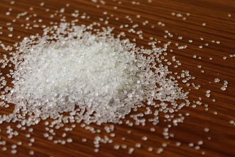 White sugar background Stock Photos