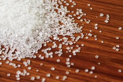 White sugar background Stock Photos