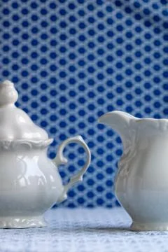 White sugar bowl and milk jug. Stock Photos