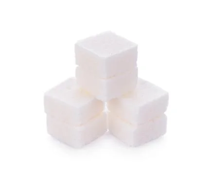 White sugar cube on white background Photos