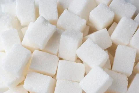 The white sugar cubes background 스톡 사진