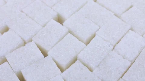 White sugar cubes circle rotation close up Stock Footage 243094210