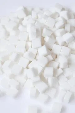 White sugar cubes Stock Photos