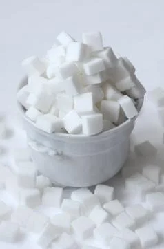 White sugar cubes Stock Photos