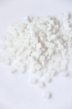 White sugar cubes Stock Photos