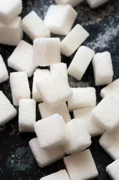 White sugar cubes Stock Photos