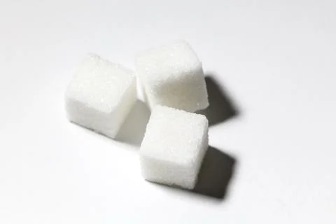 White sugar cubes Stock Photos