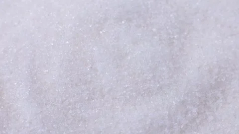 White sugar grains texture circle rotation close up Stock Footage 242773739