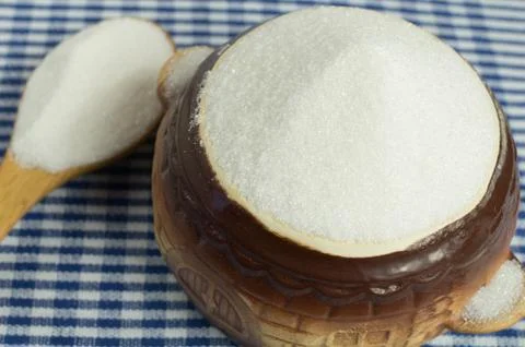 White sugar in a pot. Stock Photos