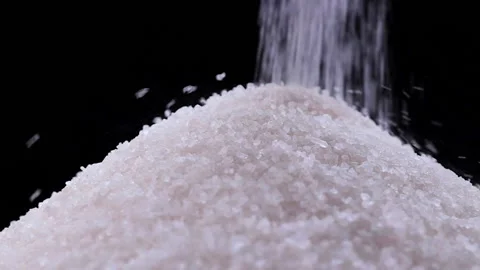 White sugar poured on black background Stock Footage 171298906