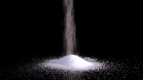 White Sugar Pouring on Black Background Stock Footage 336706956