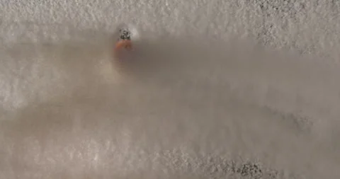 White sugar smiley drawing from below 4K pro res Stock Footage 274906913