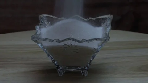 White sugars fall into the sash Stock Footage 78530063