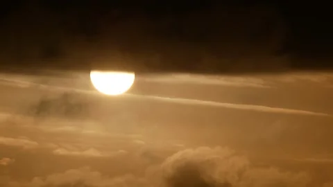 White sun, dark clouds - sunrise, sky background - Real Time - flying birds Stock Footage 152563151