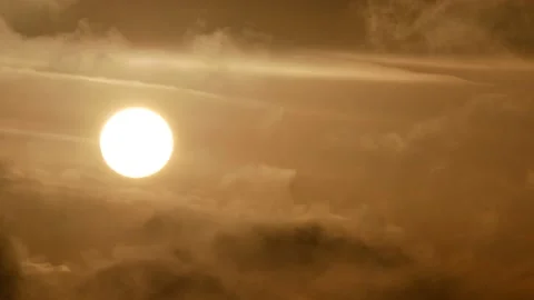 White sun, dark clouds - sunrise, sky background - Real Time - flying birds Stock Footage 152563160