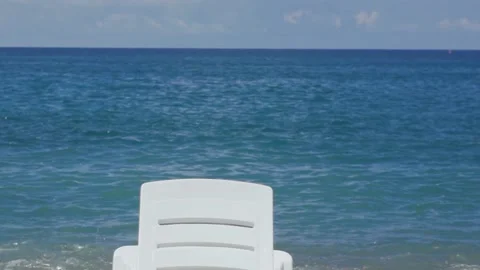 White sunbed on the seashore Stock Footage 94952778