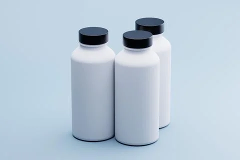 White supplement bottles studio shot, blue background, mockup Stock Illustration