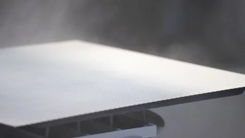 A white surface with a black object on it Stock Footage 302456622