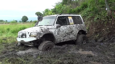 White Suv Got Stuck In The Mud, Off-Road Stock Footage 77433572