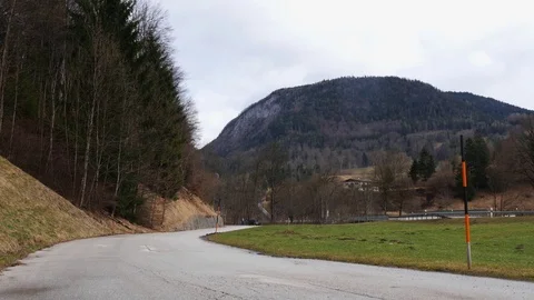 White SUV in motion on scenic highway. Video stock 82009955
