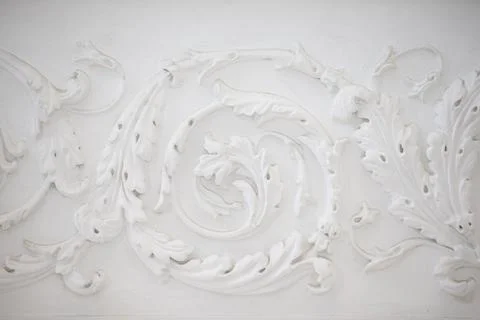 White swirling plaster pattern. Organic plaster patterns. Vintage white ceili Photos