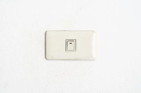 White switch on wall Stock Photos
