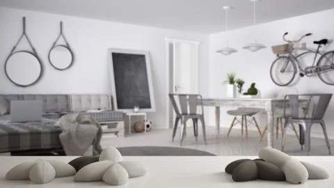 White table, desk or shelf with five soft white pillows in the shape of stars Stock Illustration