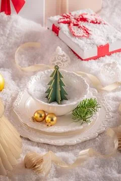White table layout decorated with sparkling baubles. Stock Photos