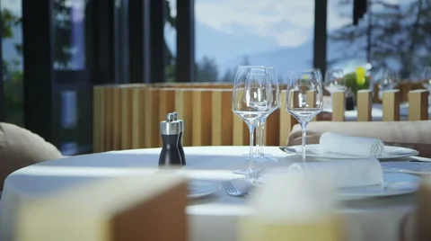 White table in a restaurant - dish and glasses Stock Footage 47139773