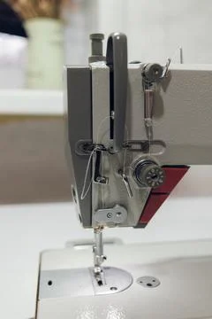 White table with a sewing machine Stock Photos