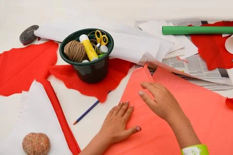 White table with various tools for child's crafts and creativity. 스톡 사진
