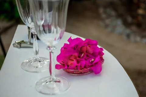 White table for a wedding ceremony with decorations on the seashore. Stock Photos