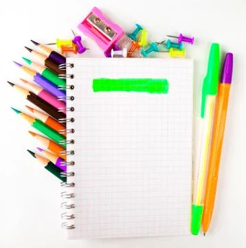 On a white table is a writing accessories Stock Photos