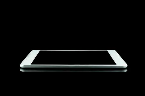 White Tablet on black background Stock Photos