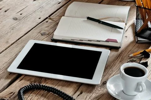 White tablet computer at office table. Free space for text. top view. Copy .. Stock Photos