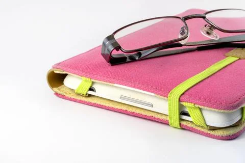 White tablet in pink case Stock Photos