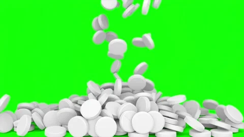 White tablets and pills falling down in a loop over green screen background Stock Footage 313560685