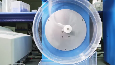 White Tablets Are Spinning In A Drum Of Friability Tester At medical Laboratory Vidéo 161020383