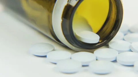 White Tablets Moving From Left to Right Stock Footage 69214339