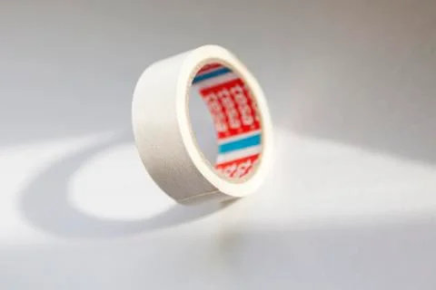 White tape falling on the table with white background and sunlight Stock Photos