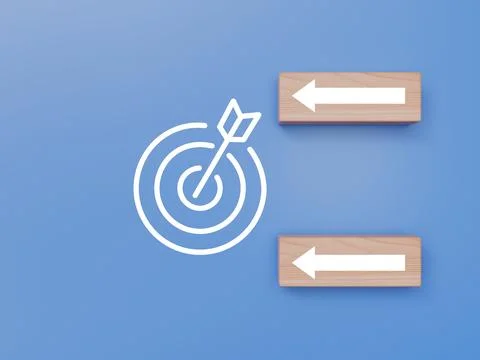 White target icon with arrow alongside two wooden blocks Stock Photos
