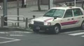 White Taxi Car Driver The Urban Streets Of Tokyo HD HD Footage